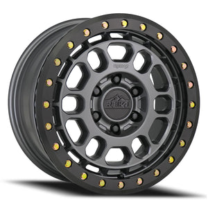 Reika R35 Satin Gunmetal W/ Black E-Coated Ring 17x8 +30 6x130mm 84.1mm